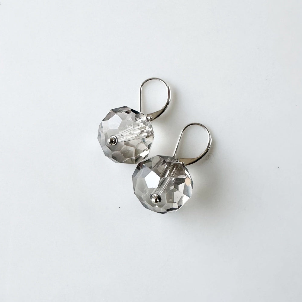 
                      
                        Large Smoke Faceted Crystals Dangle from Sterling Silver Lever Backs.
                      
                    