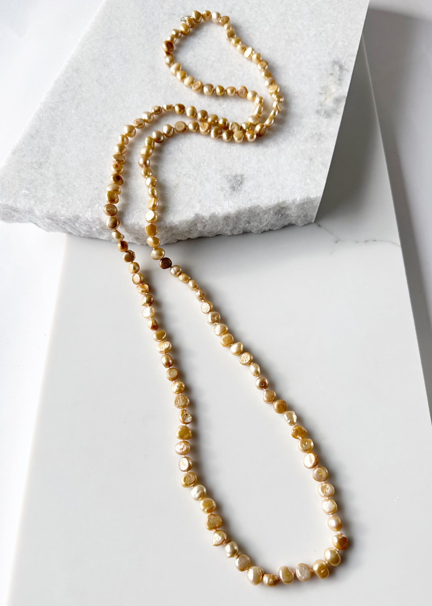 Long Necklace in Gold Baroque Freshwater Pearls. Wear as long Single strand or Doubled.