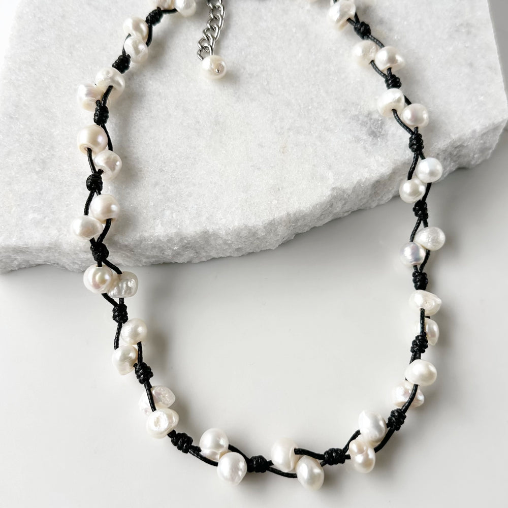 This Casually Elegant 23” Necklace has Large Organic Freshwater Pearls Knotted on Cotton Cord with a Large Lobster Claw Clasp and a 2" extender chain. Perfect for everyday! Designed in Canada