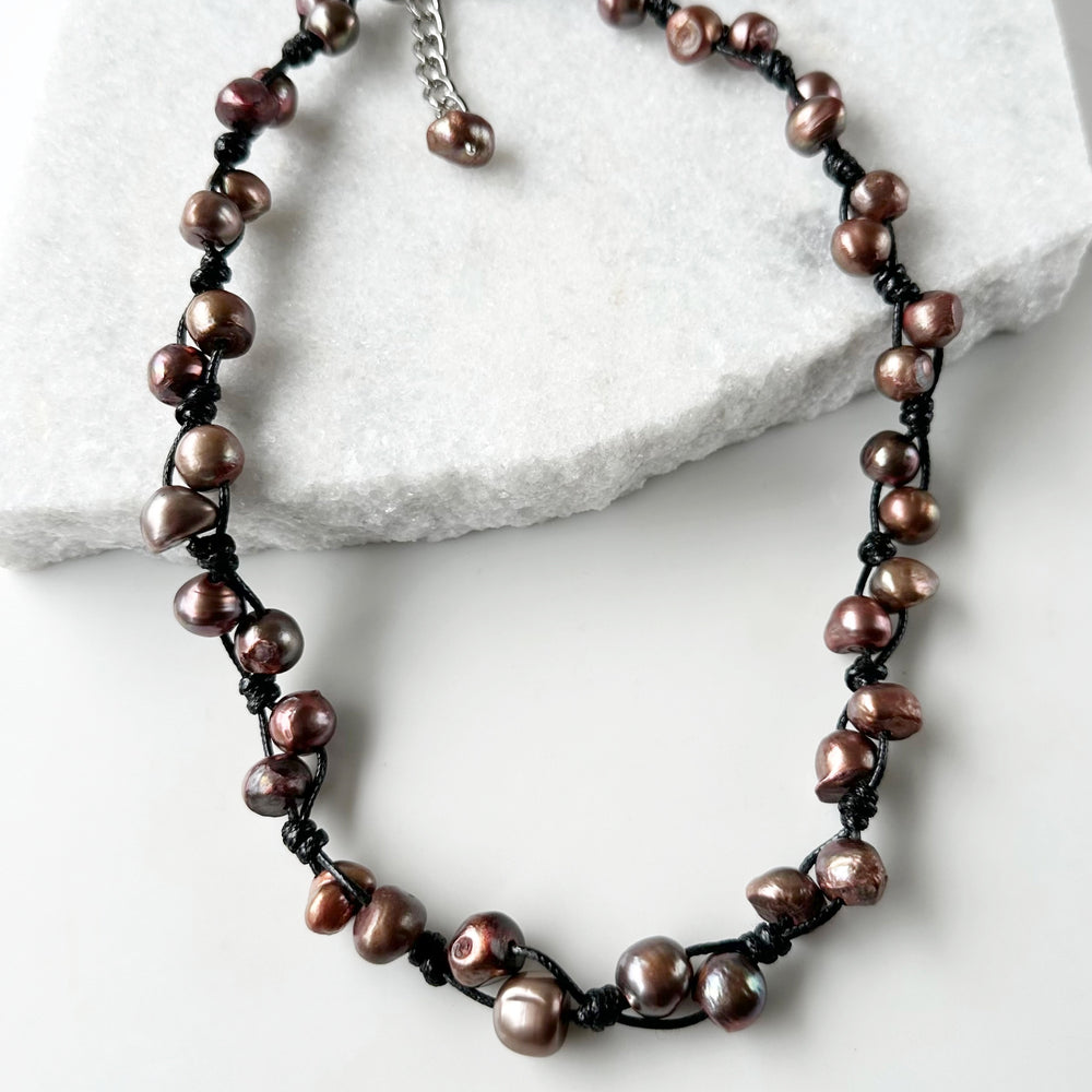 This Casually Elegant 23” Necklace has Large Organic Freshwater Pearls Knotted on Cotton Cord with a Large Lobster Claw Clasp and a 2" extender chain. Perfect for everyday! Designed in Canada