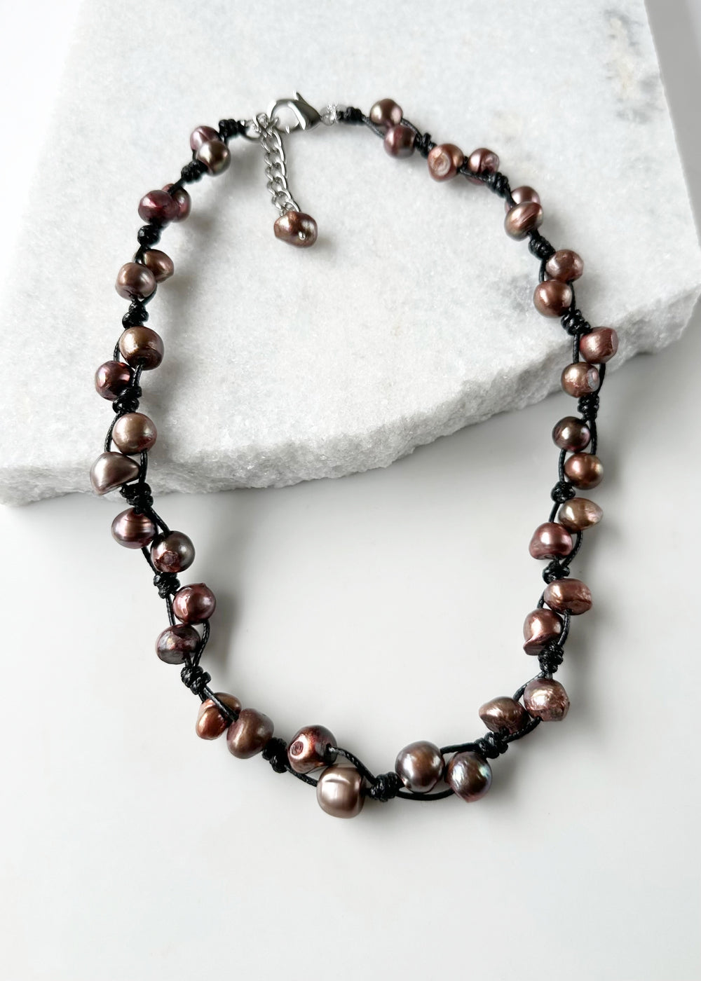 This Casually Elegant 23” Necklace has Large Organic Freshwater Pearls Knotted on Cotton Cord with a Large Lobster Claw Clasp and a 2