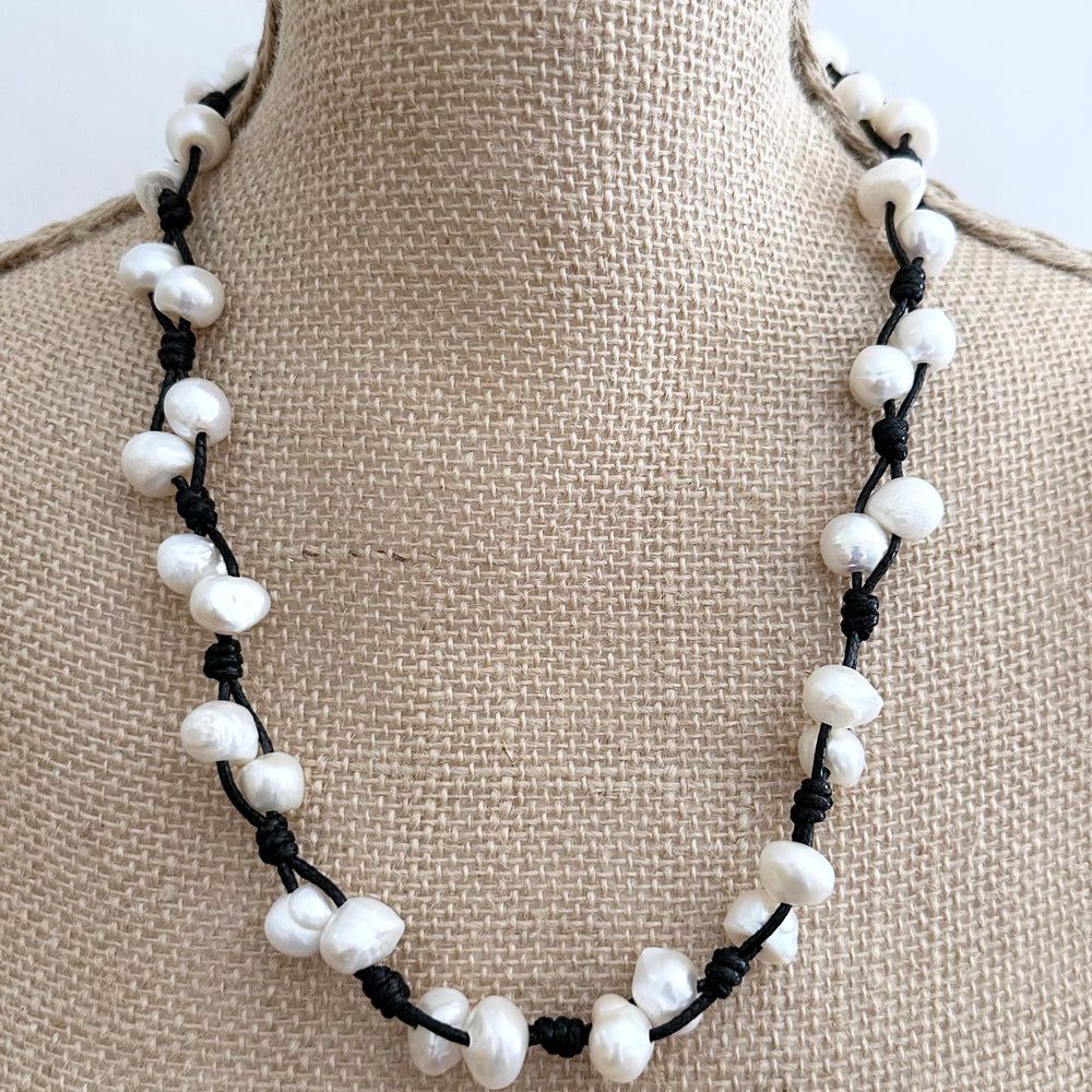 
                      
                        This Casually Elegant 23” Necklace has Large Organic Freshwater Pearls Knotted on Cotton Cord with a Large Lobster Claw Clasp and a 2" extender chain. Perfect for everyday! Designed in Canada
                      
                    