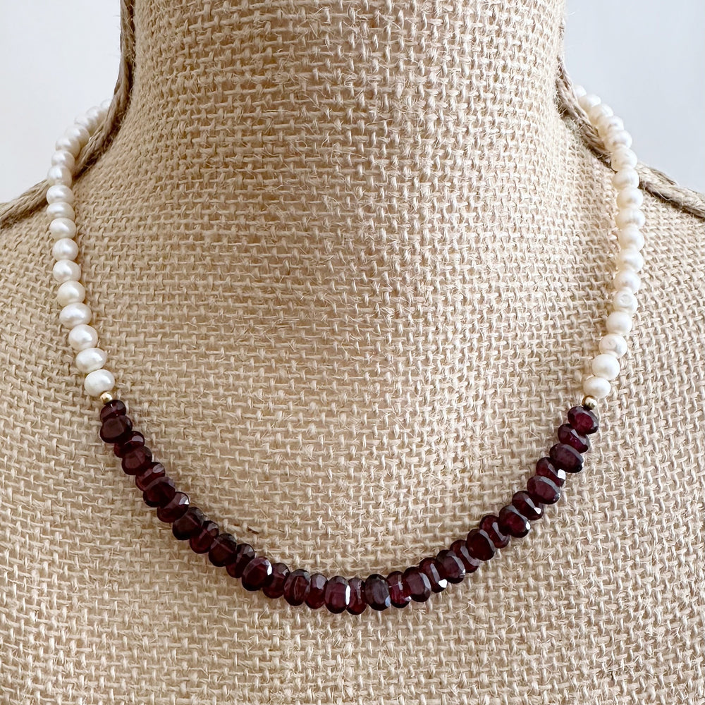 Designed and made in Canada, this one-of-a-kind 18” Necklace features Beautiful Oval-Faceted 7mm Garnets and White Freshwater Pearls Accented with Gold and Finished with a Gold-Filled Lobster Claw clasp.