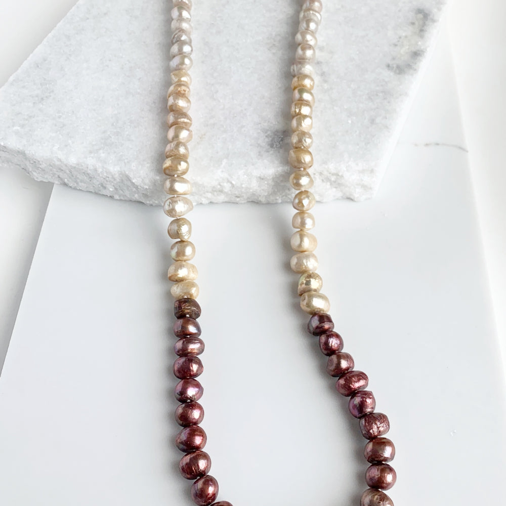 
                      
                        Large (12mm) Lustrous Brown Ombre Freshwater Pearls Knotted on a Long (36”) Necklace that allows for Single or Doubling Up. It is Completed with a Lobster Claw Clasp for Easy, Reliable Wear.
                      
                    