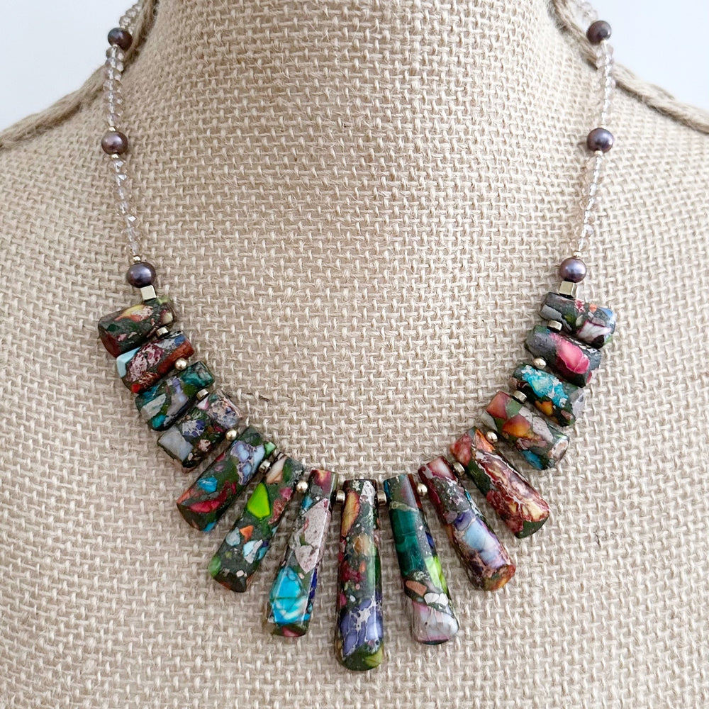 This Limited Edition 18” Necklace Boasts Vibrant Impression Jasper, Beautiful Freshwater Pearls, Crystal, Plated Hematite and Gold-Filled Beads completed with a Gold-Filled Spring Ring Clasp.