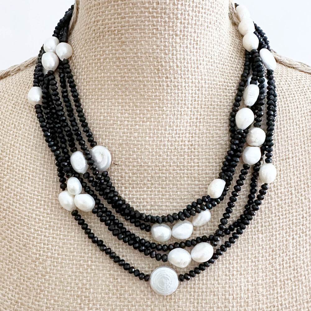 
                      
                        Long (40”) Black Crystal Necklace with Coin and Rice-Shaped Pearls Set with a Strong Secure Magnetic Clasp for Easy wear. Can be worn As Is or Doubled. On Bust
                      
                    