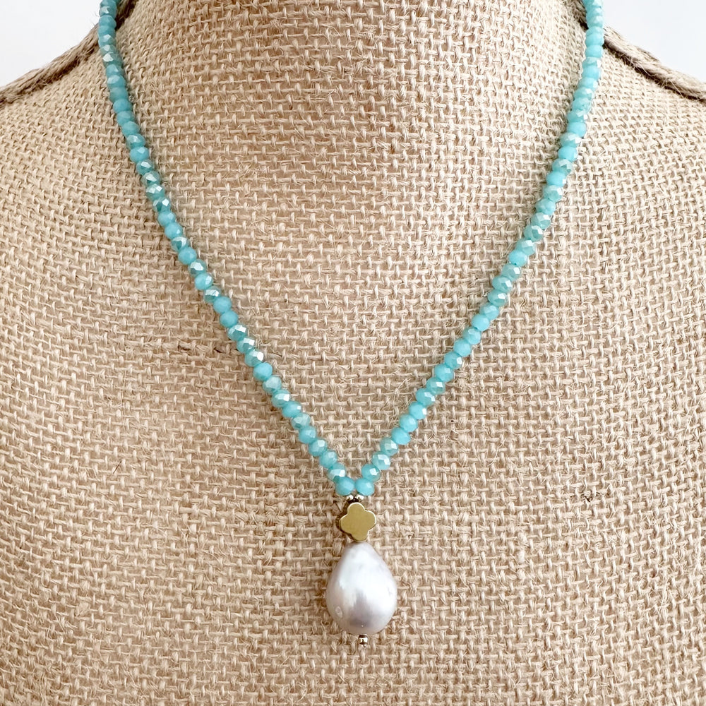 
                      
                        Faceted Pink Crystals form this Necklace with a Large Baroque Freshwater Pearl Pendant Completed with Gold accents and a Strong Secure Magnetic Clasp for East Wear. On Bust
                      
                    