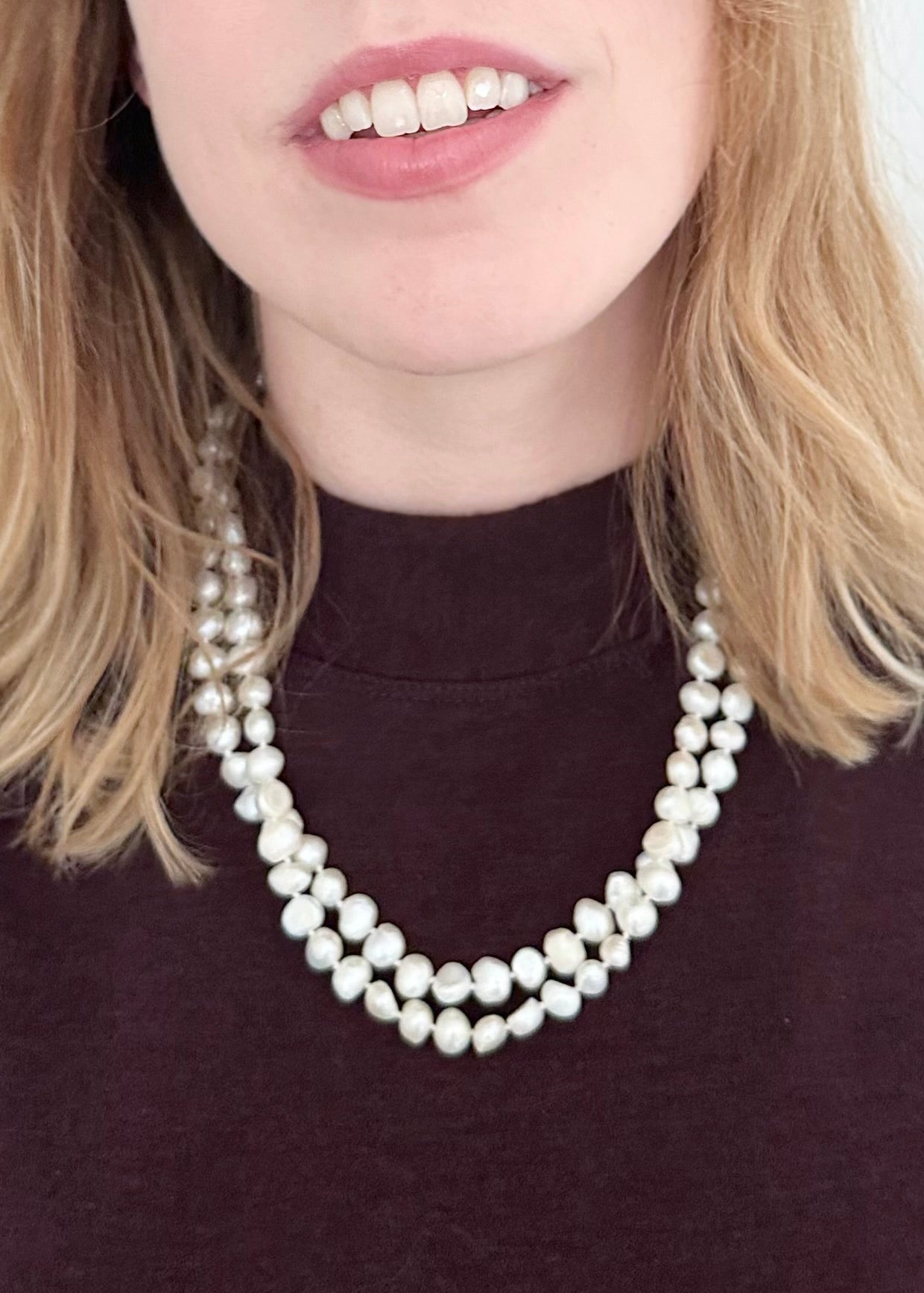 White Freshwater Baroque 8-9mm Knotted Pearls Form a 20” Lustrous Necklace with a Strong Secure Magnetic Clasp for Easy Wear. 