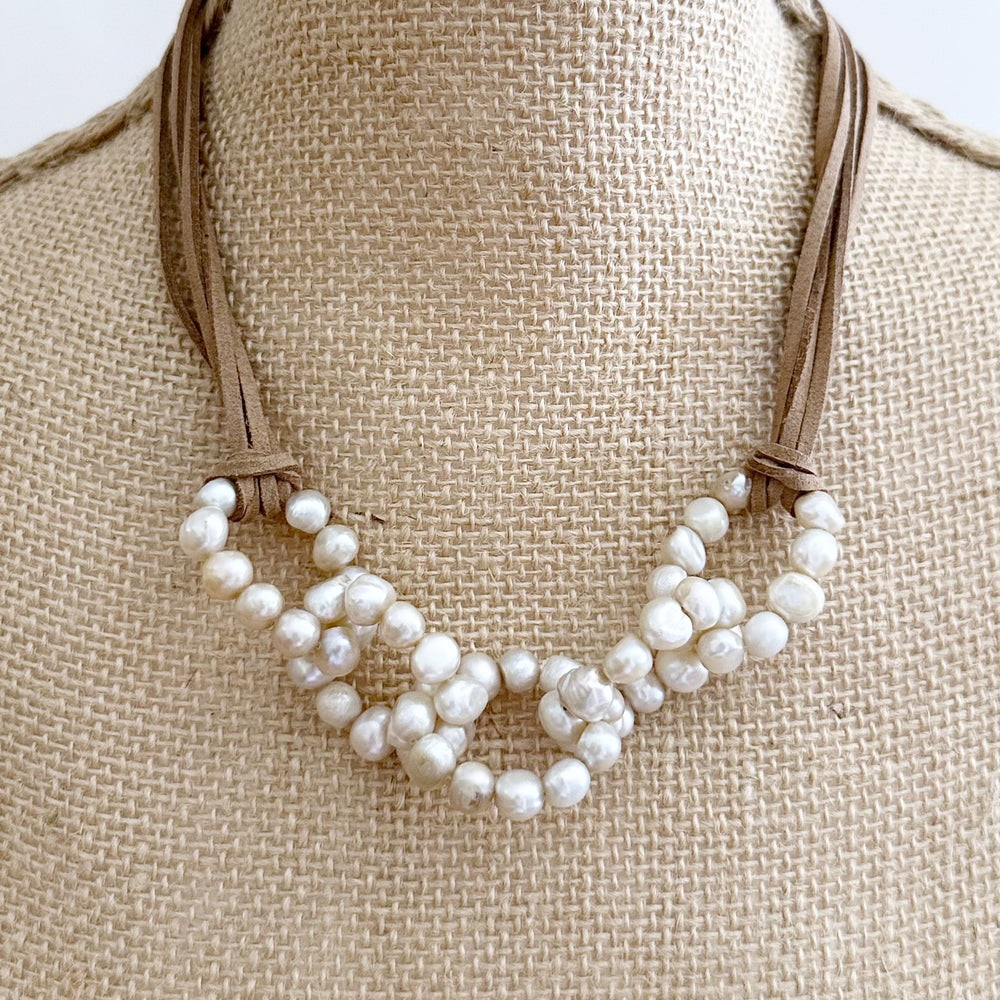 
                      
                        Chain Link of Champagne Baroque Freshwater 8-9mm Pearls Designed with Vegan Suede and a Strong Secure Magnetic Clasp for Easy Wear. On Bust
                      
                    