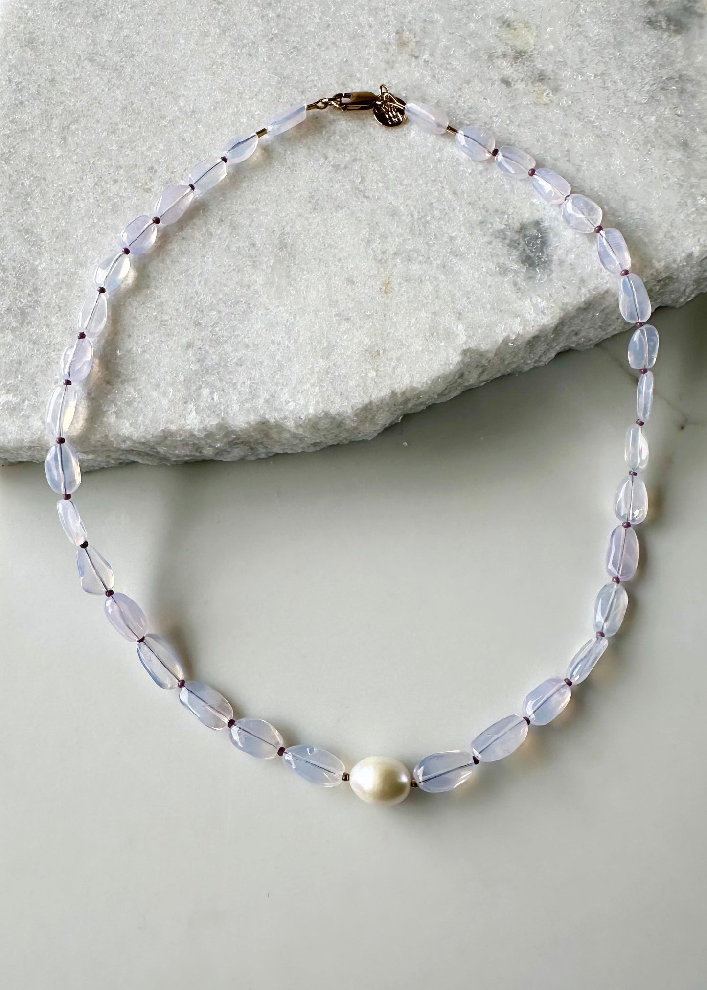 Pretty Limited Edition 20.5" Necklace with Beautiful Lavender Amethyst (Soft Milky Finish) and a Large White Freshwater Pearl with Gold Accents.  Designed and Made in Canada, this piece is Finished with a Gold-Filled Lobster Claw Clasp.