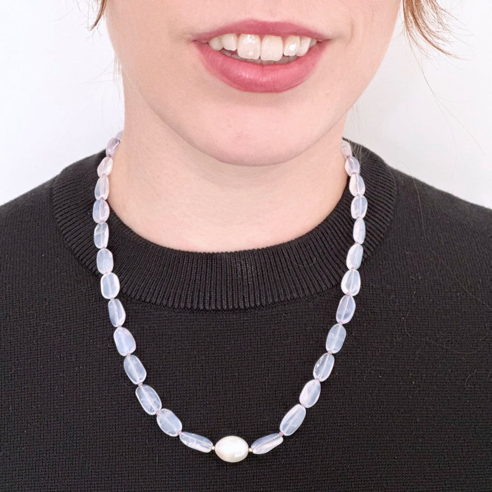 Pretty Limited Edition 20.5" Necklace with Beautiful Lavender Amethyst (Soft Milky Finish) and a Large White Freshwater Pearl with Gold Accents.  Designed and Made in Canada, this piece is Finished with a Gold-Filled Lobster Claw Clasp.