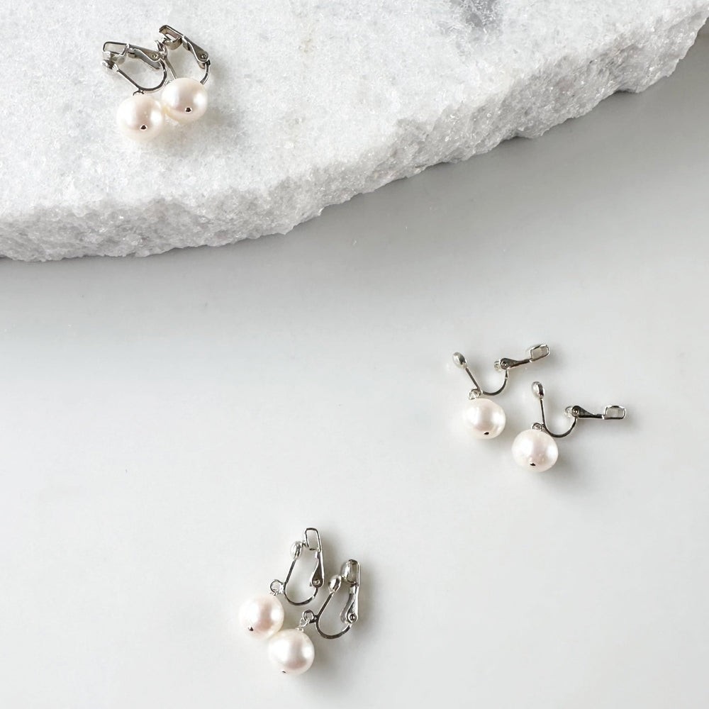 
                      
                        This Elegant Clip-On Earring Features a Beautiful Freshwater White 10mm Pearl Drop on Sterling Silver. Designed and made in Canada
                      
                    