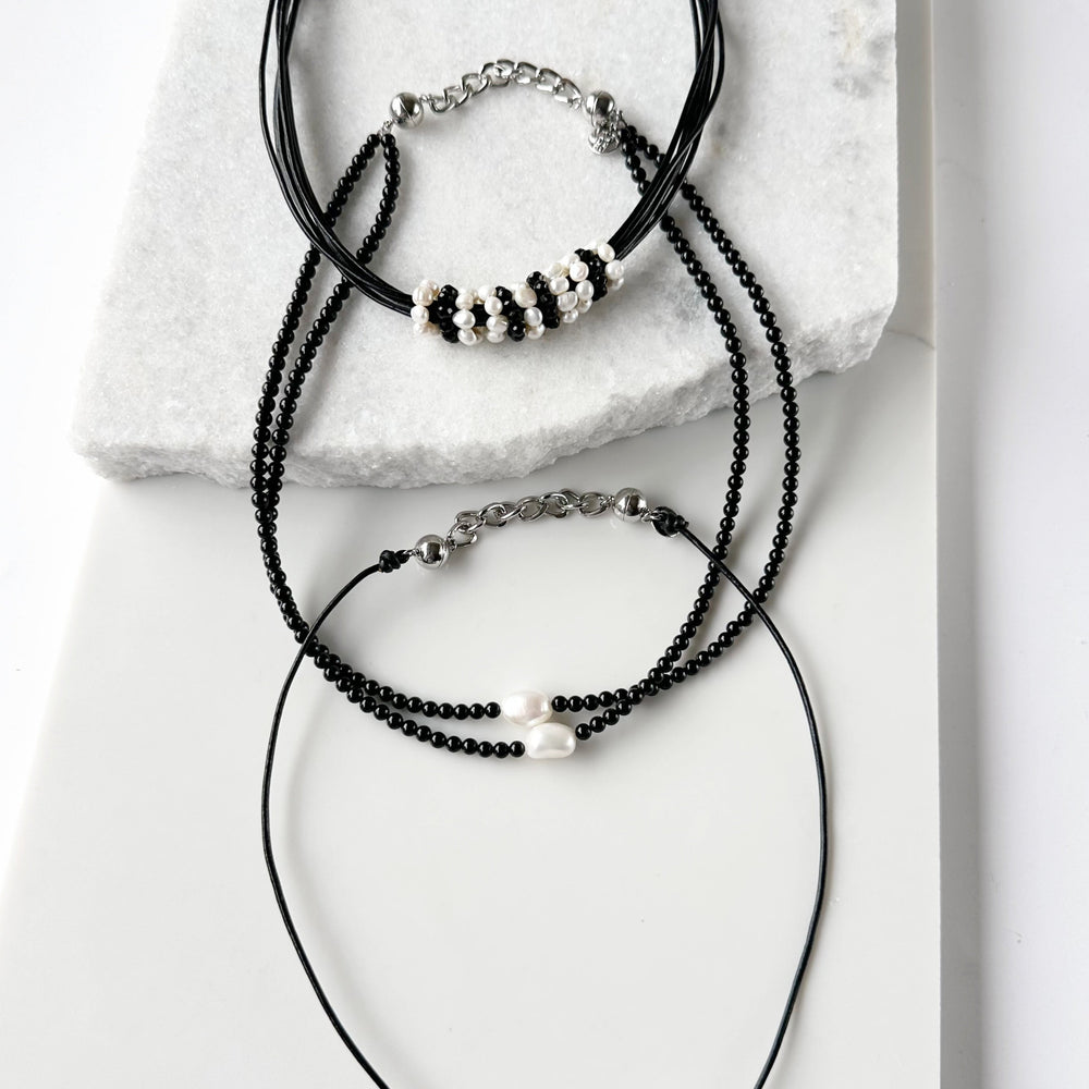 
                      
                        This 2” Extender Chain is Silver-toned and fits with round magnetic clasps on various Wanted Jewelry Necklaces. Shown attached to three available Necklaces.
                      
                    