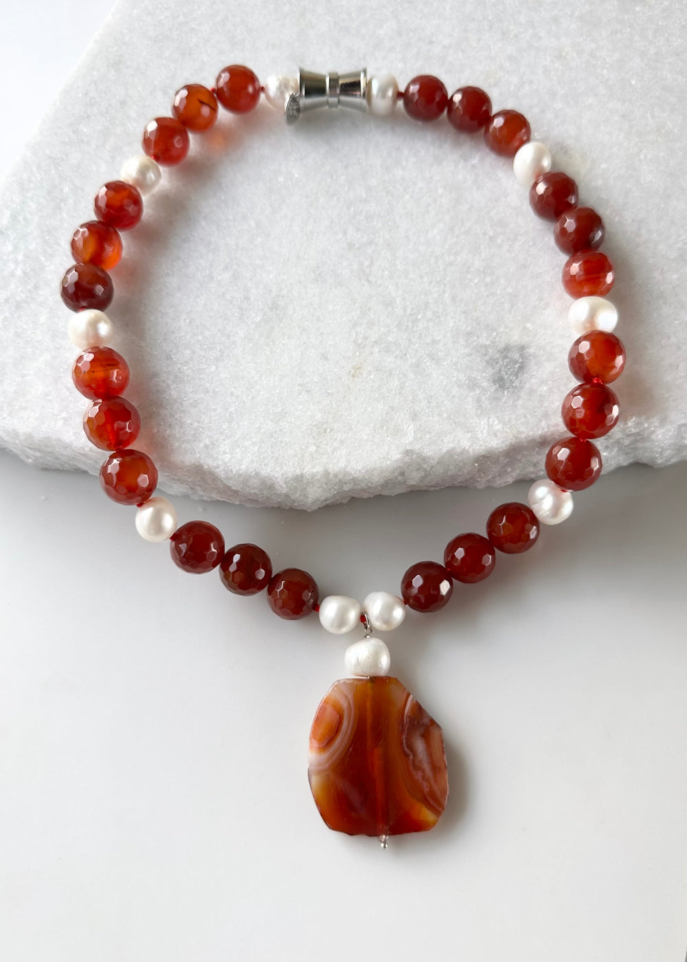 Large Freshwater Pearls Adorn this Necklace of Large (14mm) Carnelian with 2” Pendant and a Strong Secure Magnetic Clasp for Easy Wear.