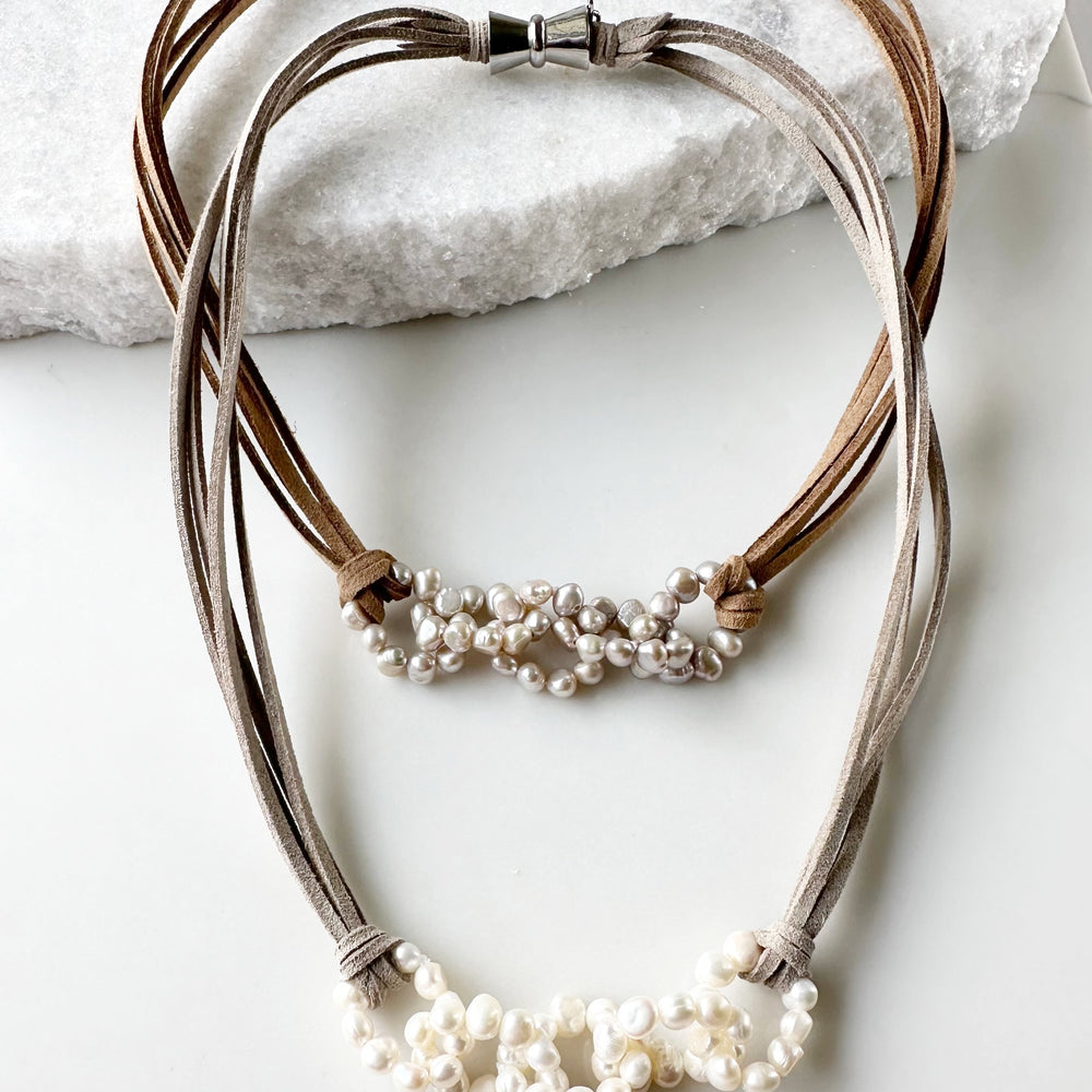 
                      
                        4-5mm Linked Baroque White Freshwater Pearls on Vegan Suede Cord with Strong Secure Magnetic Clasp for Easy Wear. Both Colors shown
                      
                    