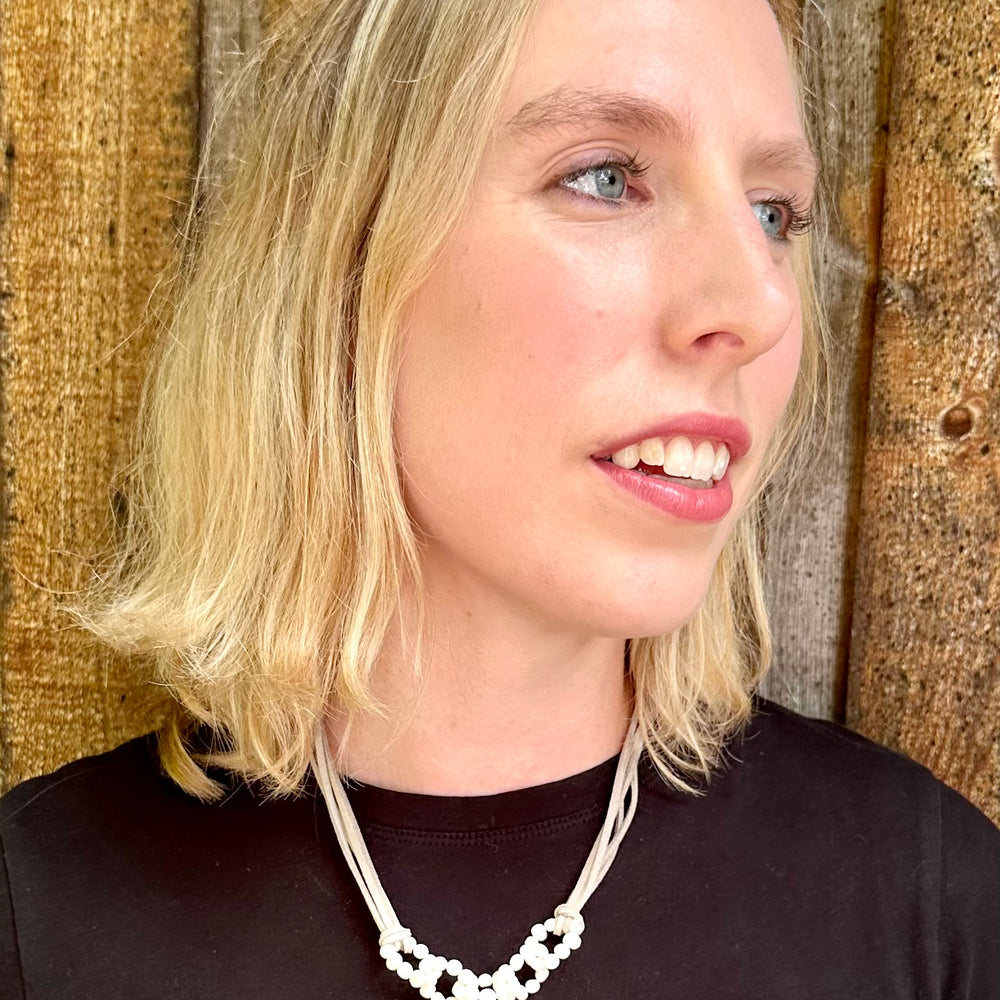 
                      
                        4-5mm Linked Baroque White Freshwater Pearls on Vegan Suede Cord with Strong Secure Magnetic Clasp for Easy Wear. On Model
                      
                    
