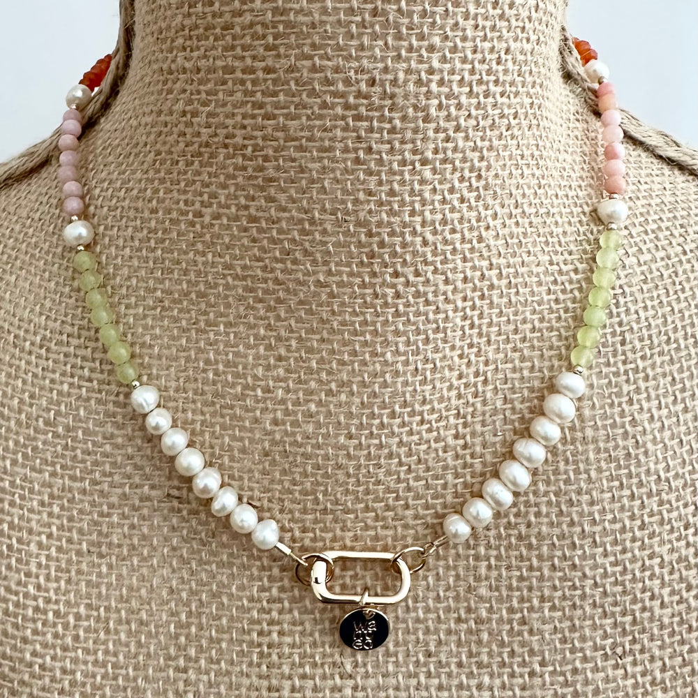 
                      
                        A Trio of Semi-Precious Stones, 5mm White Freshwater Pearls, Gold-Filled Beads and a Gold-Plated Rectangular Charm Clasp Combine to Make this 18” Necklace a One-Of-A-Kind Treat. On Bust
                      
                    