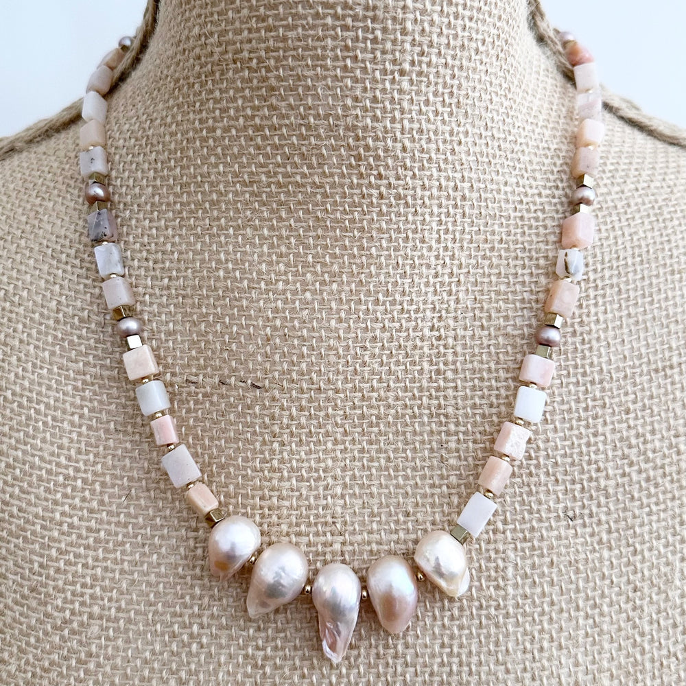 
                      
                        Exquisite 20.5” Necklace with Five Large Pink Baroque Pearls Surrounded by Pink Opal, Accented by Gold-Plated Hematite and Finished with a Gold-Plated Lobster Claw for Secure Wear. On Bust
                      
                    
