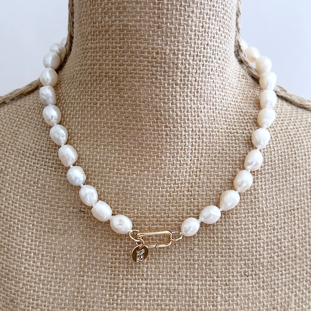 
                      
                        Lustrous Baroque Freshwater Pearls are Knotted in White with a Gold  Charm Clasp to Place your Favorite Pendants.  And Wear the 18.5” Necklace in Reverse to show off the Classic Pearls. On Bust
                      
                    