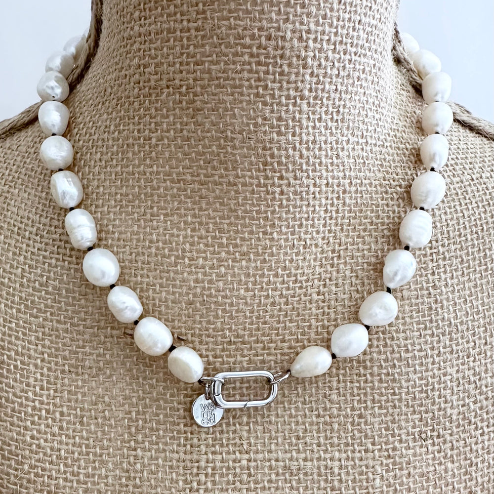 
                      
                        Lustrous Baroque Freshwater Pearls are Knotted in Black with a Silver Charm Clasp to Place your Favorite Pendants.  And Wear the 18.5” Necklace in Reverse to show off the Classic Pearls. On Bust
                      
                    