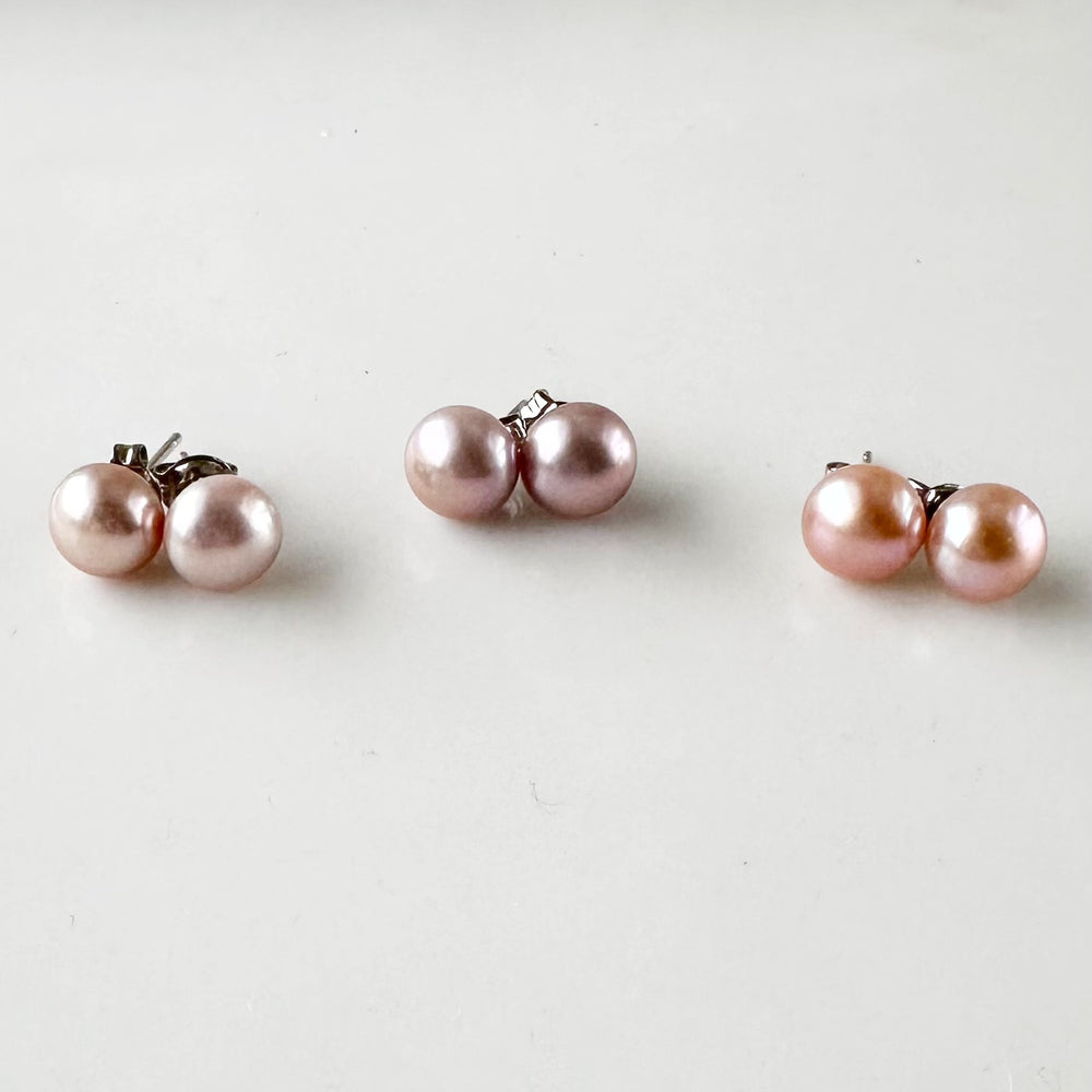 
                      
                        These Pretty Pink 8mm Freshwater Pearl Stud Earrings are on Sterling Silver Post and Butterfly.  A Fan Favorite! Three Showing Color Variation.
                      
                    