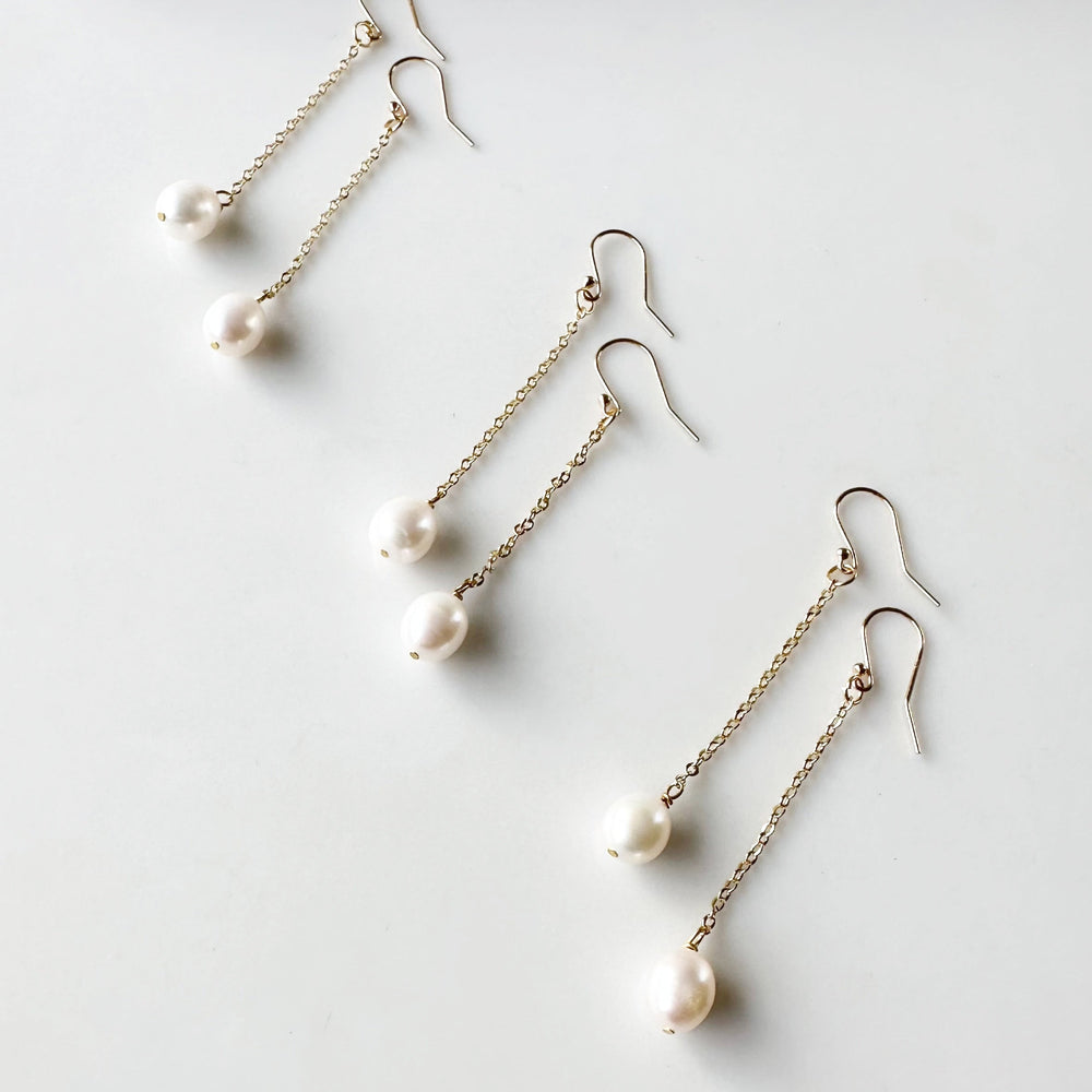 
                      
                        2.5” Delicate Gold-Plated Chain and Freshwater Pearl Drop Earring on Gold-Plated Hooks. Three Shown
                      
                    
