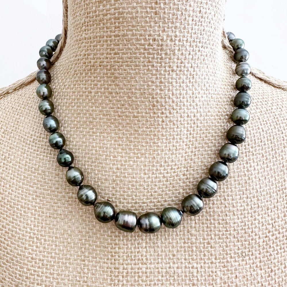 Gorgeous Graduated Strand of 9-11mm Baroque Tahitian Pearls on 18” Necklace with Sterling Silver Bean Clasp.  One Available at this Terrific Piece! On Bust