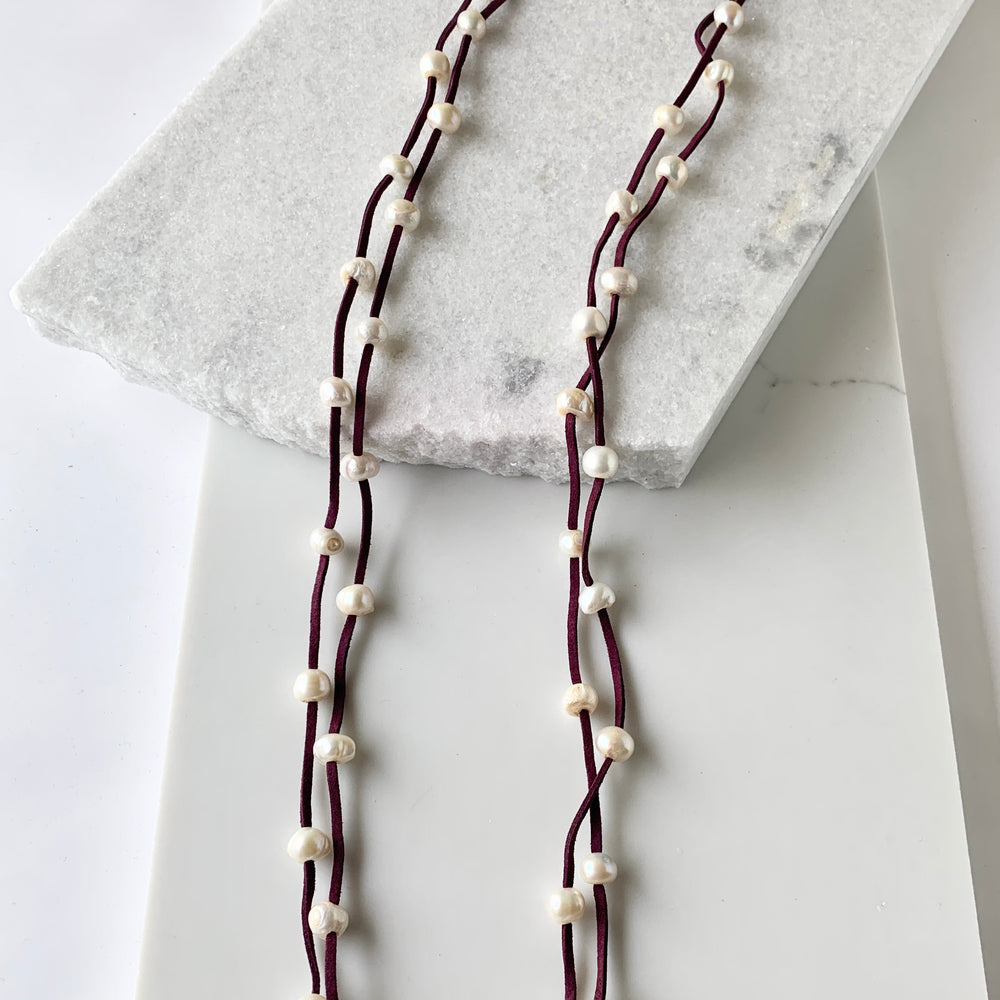 Large Baroque Freshwater White Pearls Floating on Two Strands of Wine Vegan Suede for 40” Long Necklace Completed with Strong Secure Magnetic Clasp for Easy Wear.