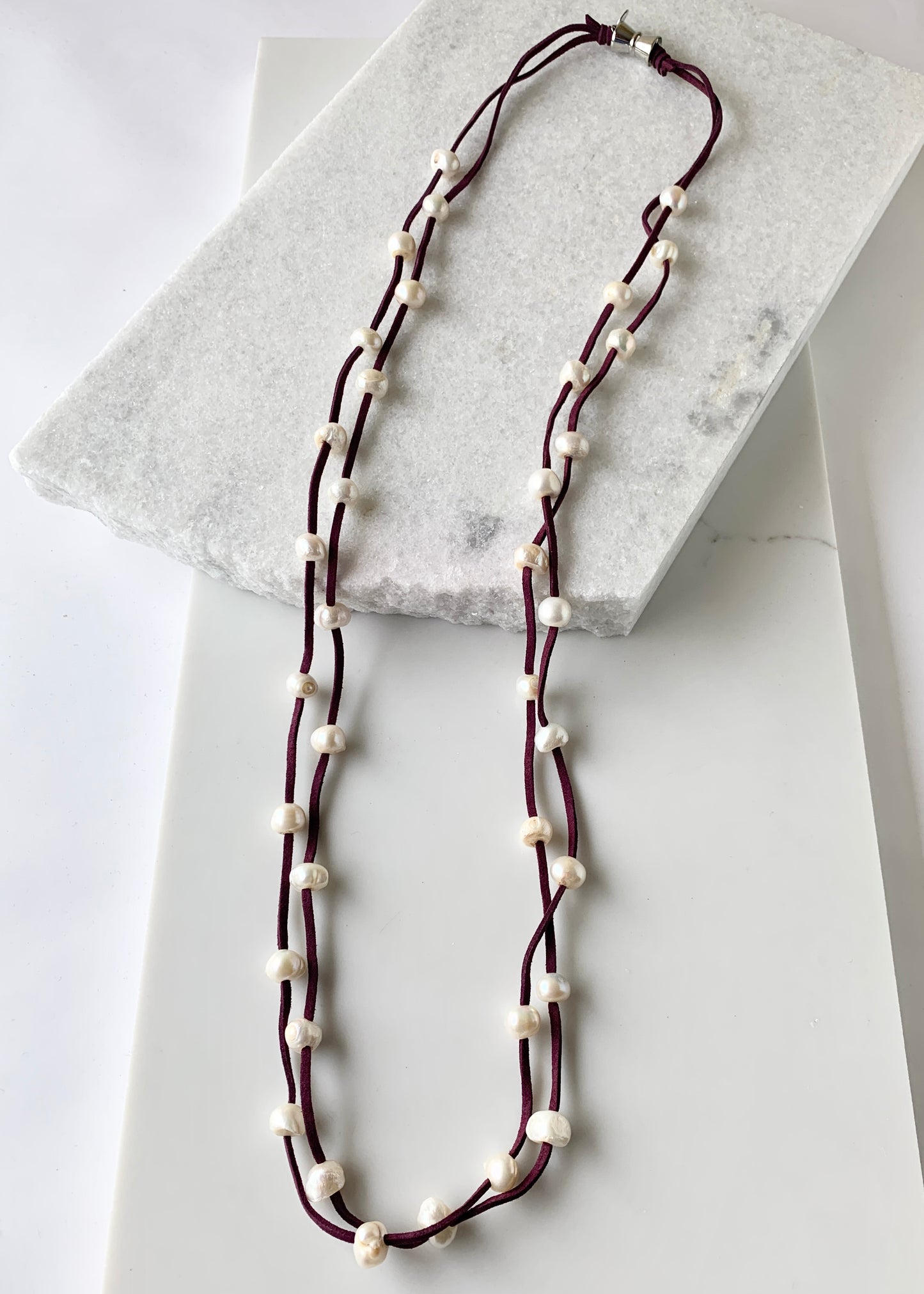 Large Baroque Freshwater White Pearls Floating on Two Strands of Wine Vegan Suede for 40” Long Necklace Completed with Strong Secure Magnetic Clasp for Easy Wear.