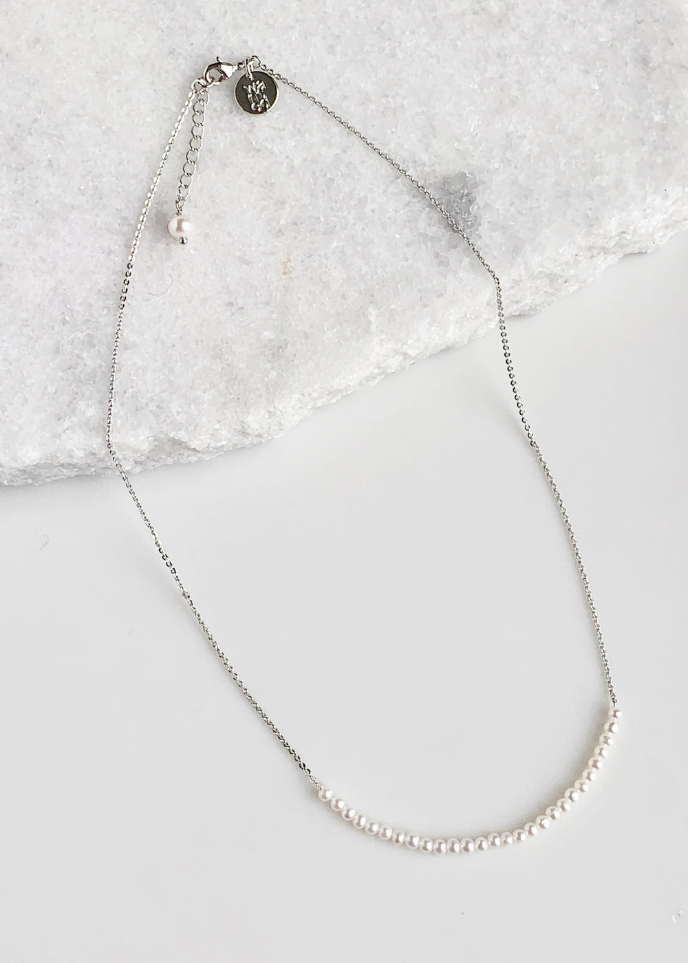 3mm Freshwater White Pearls on White Gold 18” Chain with 1.25” Extender for this Delicate and Classic Necklace which can also be Worn Layered with other Favorites.  