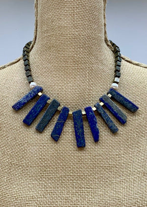 
                  
                    LAPIS, PYRITE & PEARL NECKLACE - WANTED ONE OF A KIND
                  
                