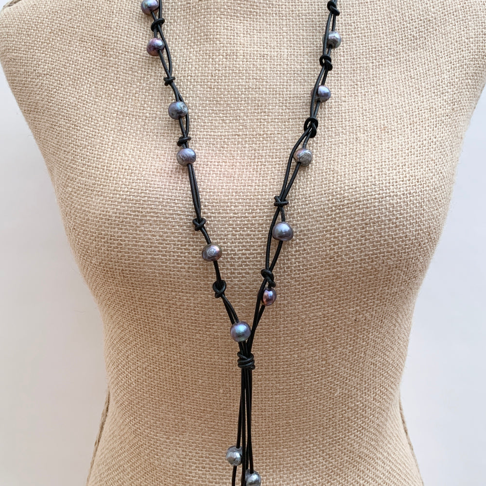 
                      
                        Black Freshwater Pearl Necklace on Black Leather showing on Bust
                      
                    