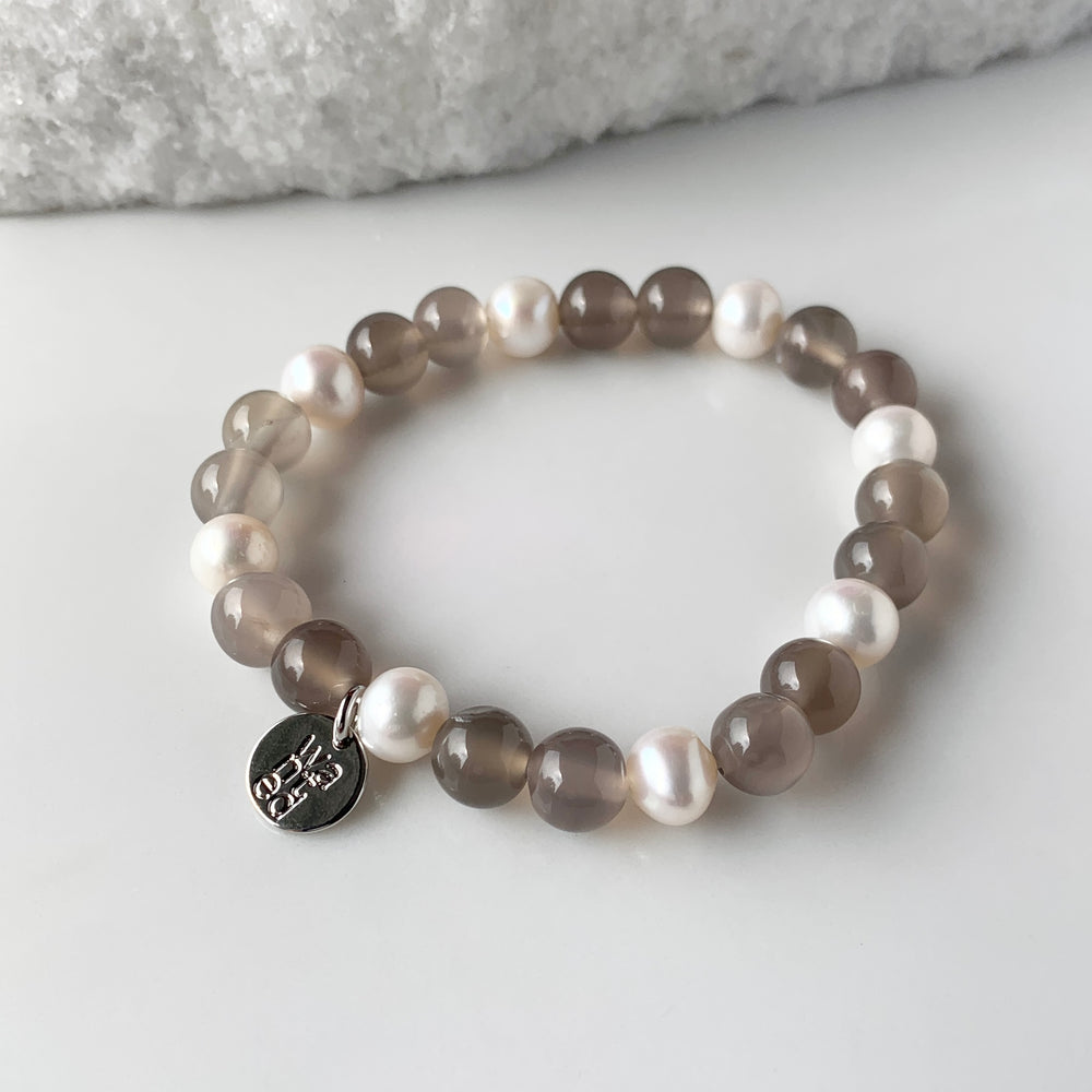 
                      
                        White Freshwater Pearl with Grey Agate Stretch Bracelet.  Perfect for layering!
                      
                    