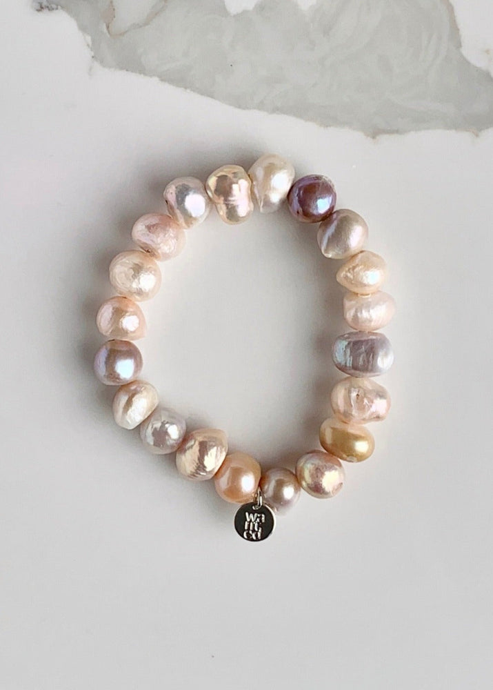 
                      
                        Large Baroque Natural Pink Freshwater Pearls are designed in this Stretch Bracelet. This can be worn by itself or Stacked with others.
                      
                    