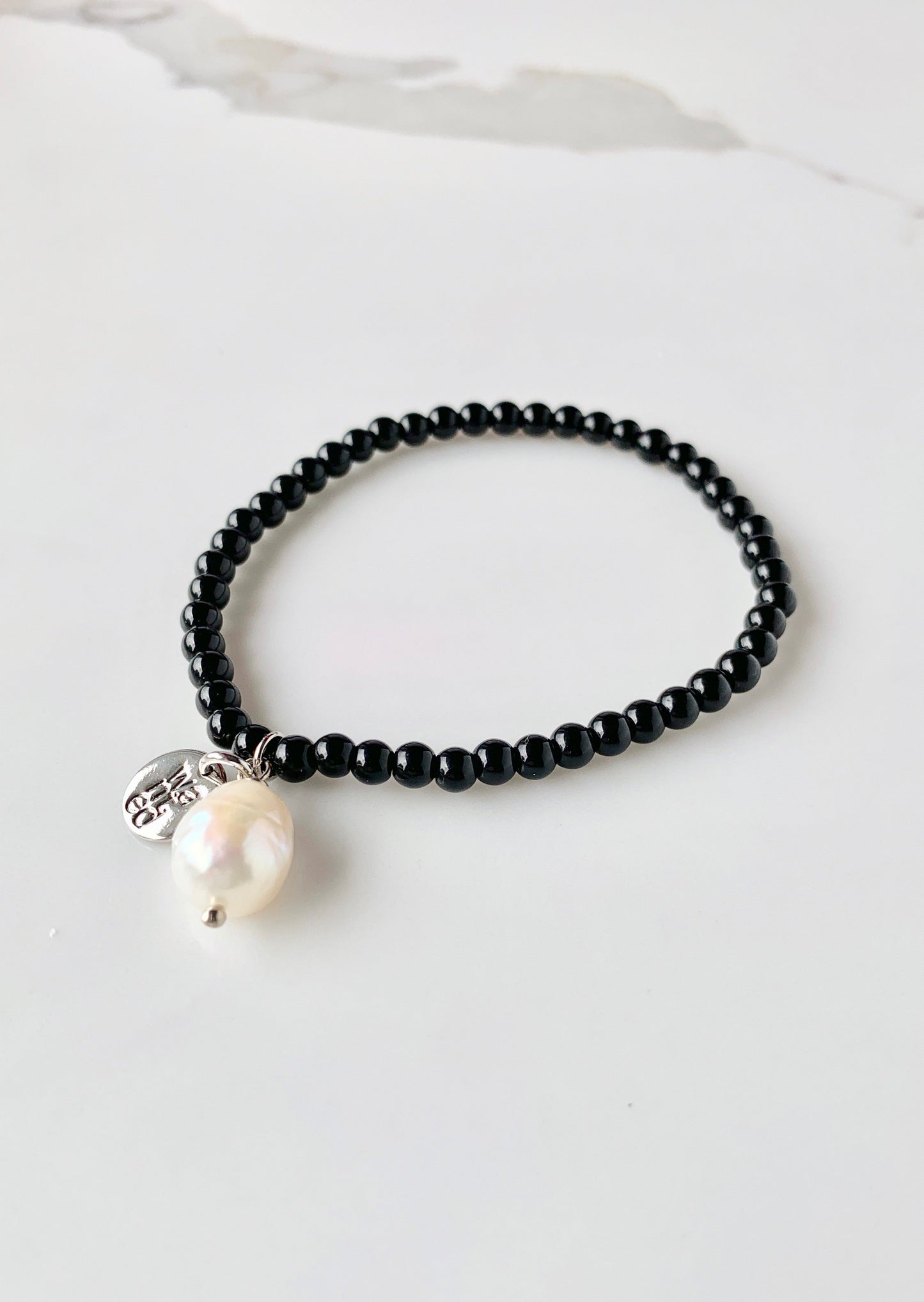 Stackable Black Agate Bracelet with White Baroque Freshwater Pearl Drop.