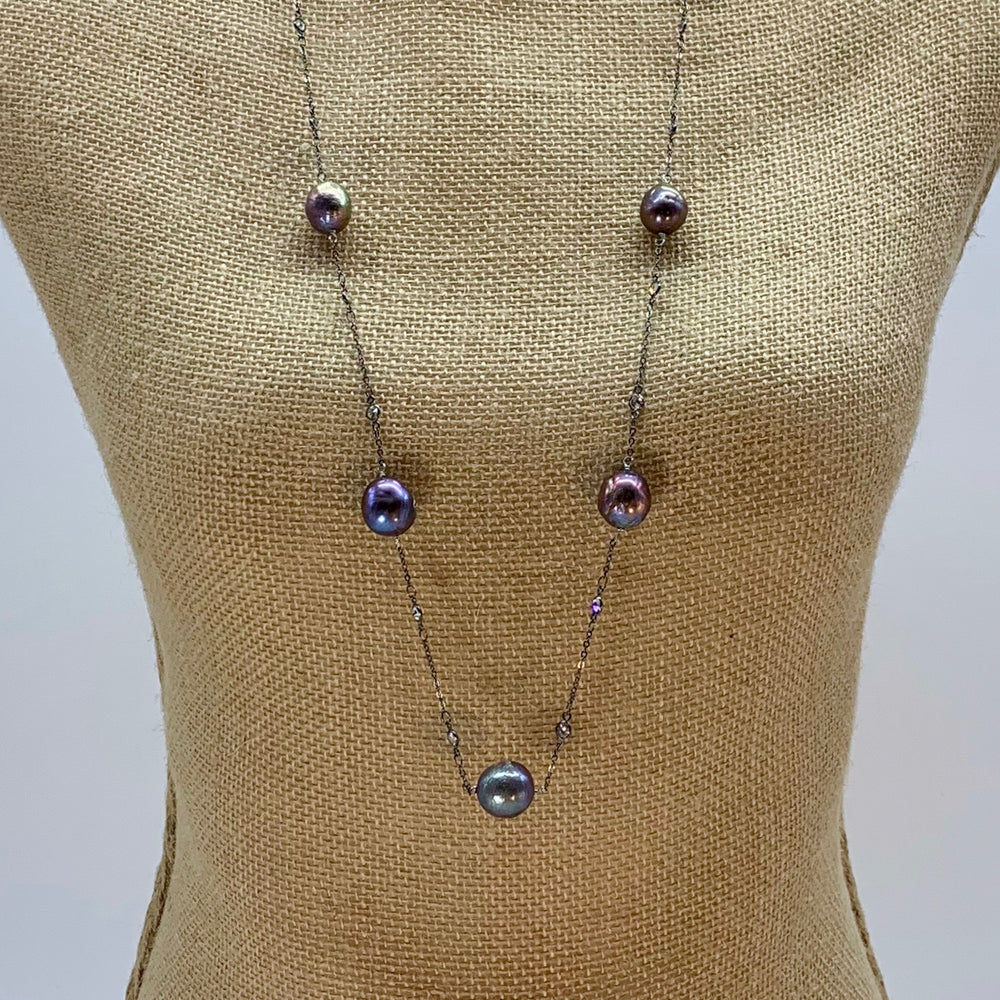 
                      
                        Long (36”) Necklace with Large Edison Freshwater Pearls on Gunmetal Chain with Crystal Links.  A Lobster Claw Clasp with a 1.5" extender Aids in Easy Wear. On Bust
                      
                    
