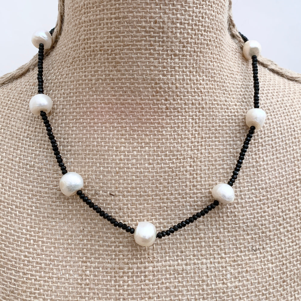 
                      
                        White Freshwater Pearls and Black (2mm) Faceted Crystals form this 18” Necklace with 1.5” Extender.  The Piece is finished with a Lobster Claw Clasp. On Bust
                      
                    