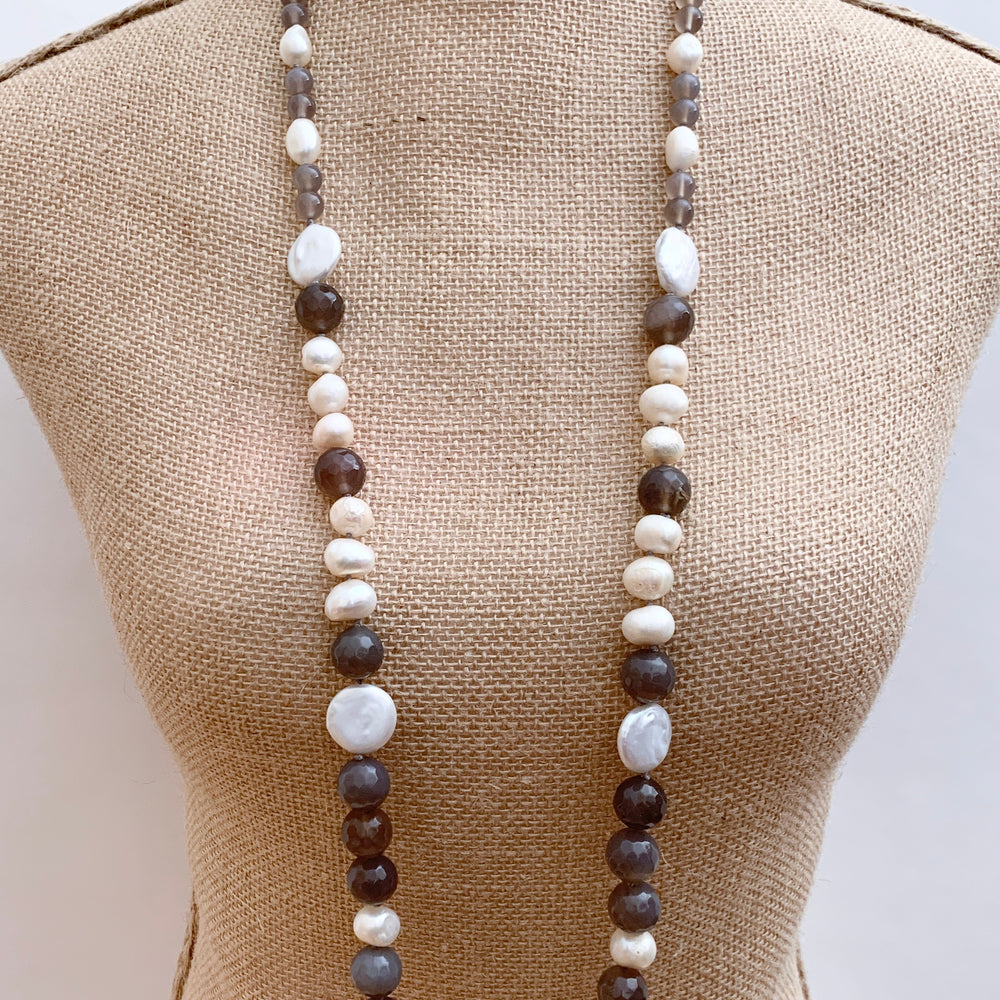 
                      
                        Large White Baroque and Coin Freshwater Pearls Adorn this Necklace with 8-14mm Faceted Grey Agate. On Bust
                      
                    