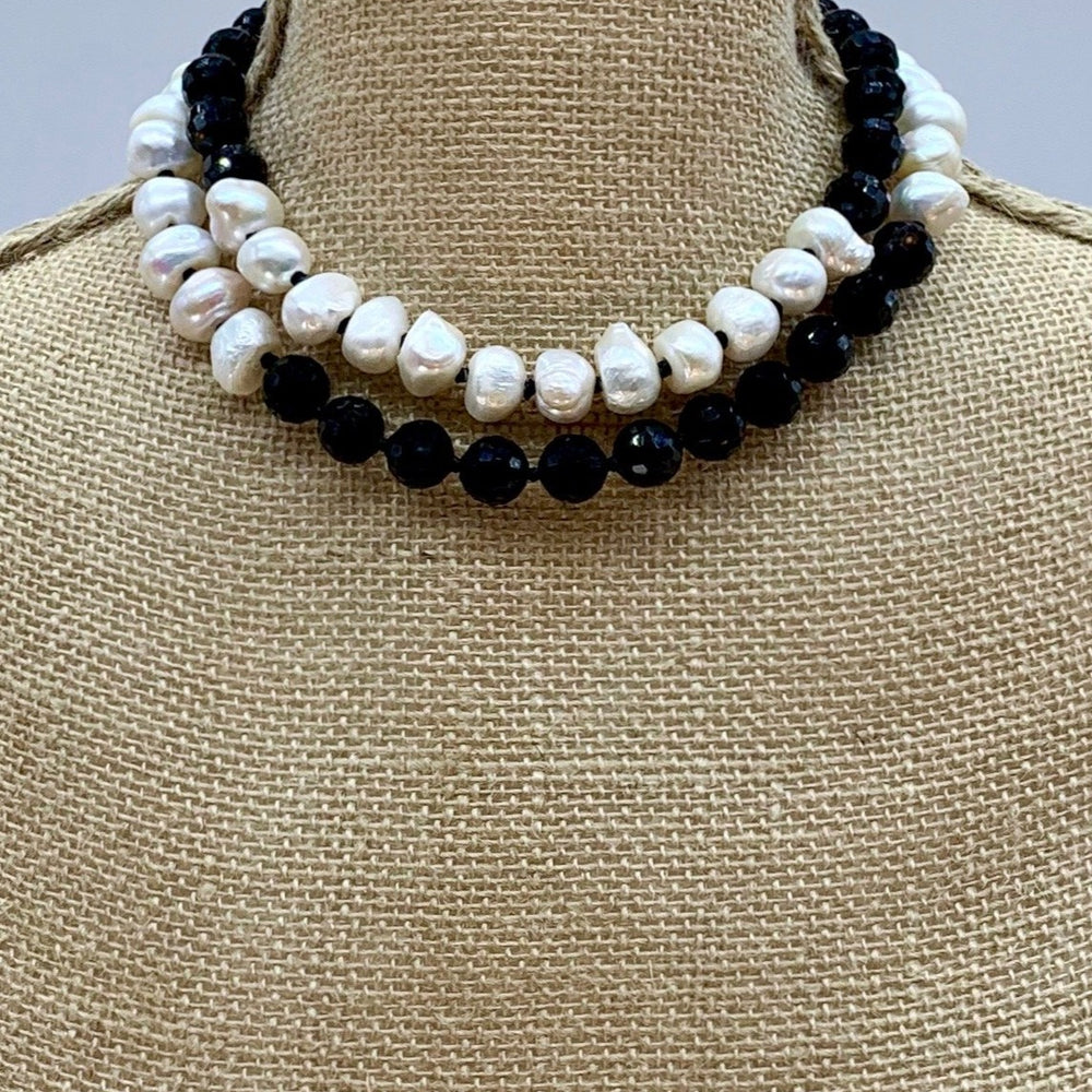 
                      
                        Large Baroque Freshwater Pearls and Black Faceted Glass on a Long 32” Necklace.  Can be Worn Long or Doubled. Shown Doubled on Bust
                      
                    