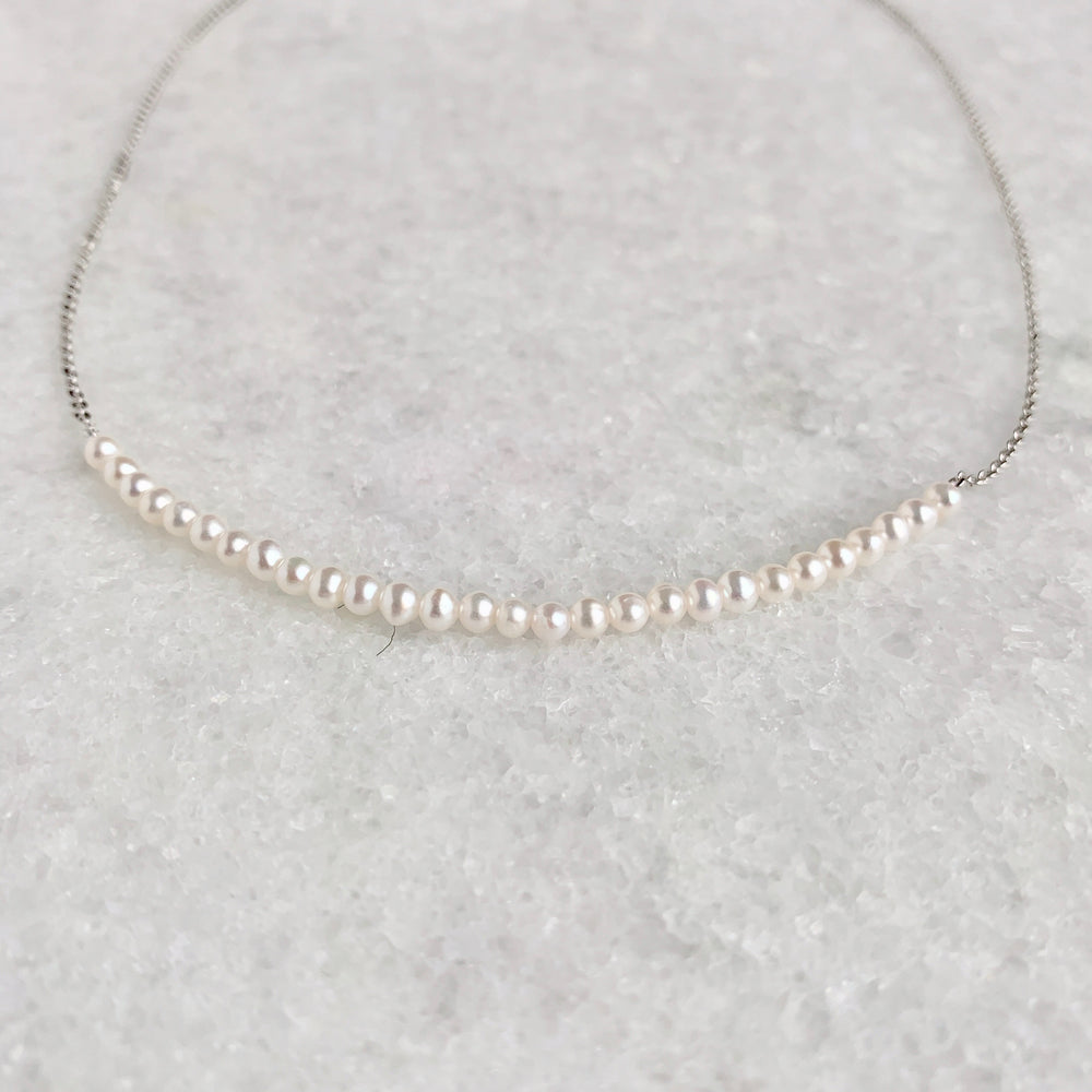 
                      
                        3mm Freshwater White Pearls on White Gold 18” Chain with 1.25” Extender for this Delicate and Classic Necklace which can also be Worn Layered with other Favorites.  Focus on Lustrous Pearls
                      
                    